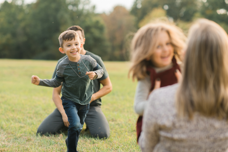 Fall is in full swing here in NJ, my first Fall Family session with Anna and Adam at their Farm House in Hackettstown NJ. Anna and Adam recently purchased their dream farm house on a 4 acres of land. This family of four now has chickens, ducks, birds, cats, a dog, sheep and plans to add many more to the list in the future. I had the honor of visiting Anna and Adam and their two beautiful children at their Farm the other day. I got much need vitamin D walking around the property, enjoying the foliage, running around with their kids and meeting all the farm animals. I sincerely enjoy photographing families now because there are no dull moments with kids, every moment is perfect! Fall family session at Anna and Adam’s Farm at Hackettstown NJ photographed by Karis from HeyKaris.